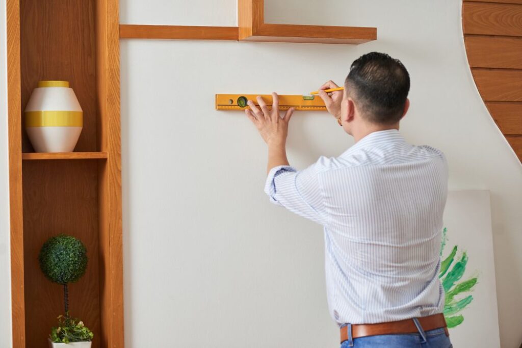 Installing floating shelf using a Spirit Level