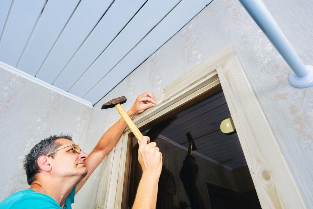 homeowner using hammer