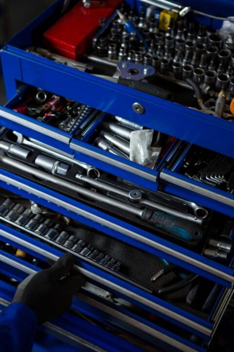 Organized toolbox with tools being cleaned after a project